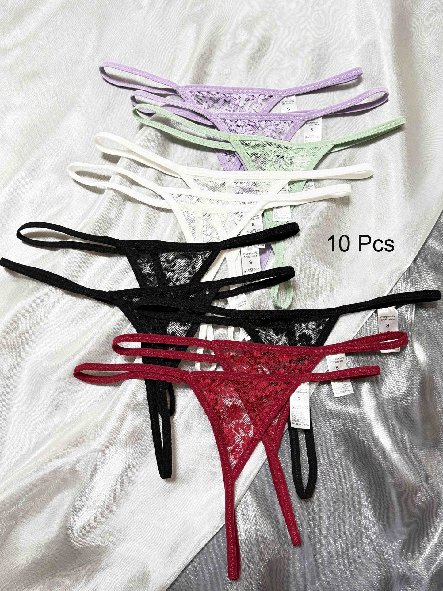 10-pack of sexy lace thong panties for women, low-rise polyamide fabric, transparent triangle design, adult theme, solid color with lace detailing