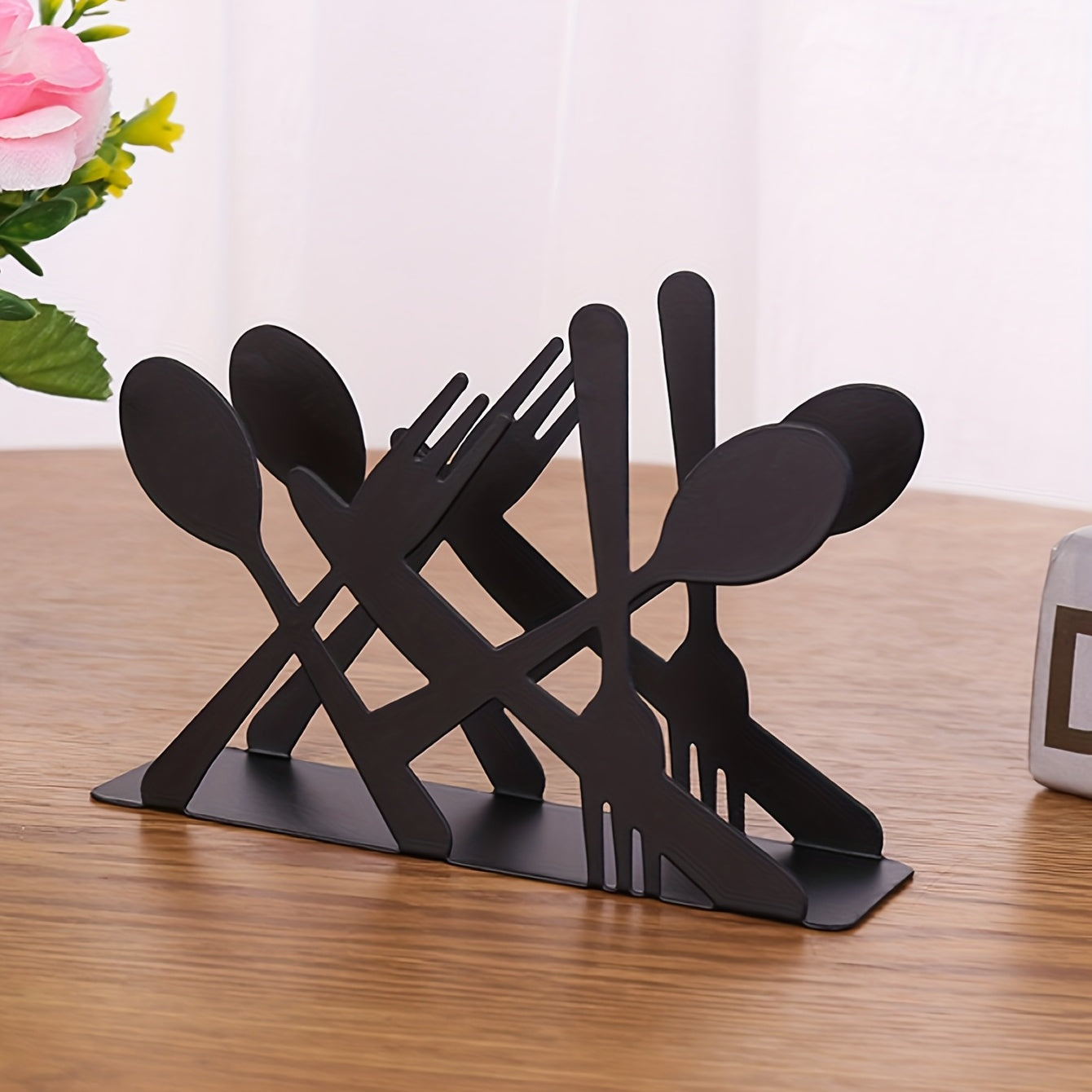 Black cast iron napkin dispenser for home and restaurant table decor.