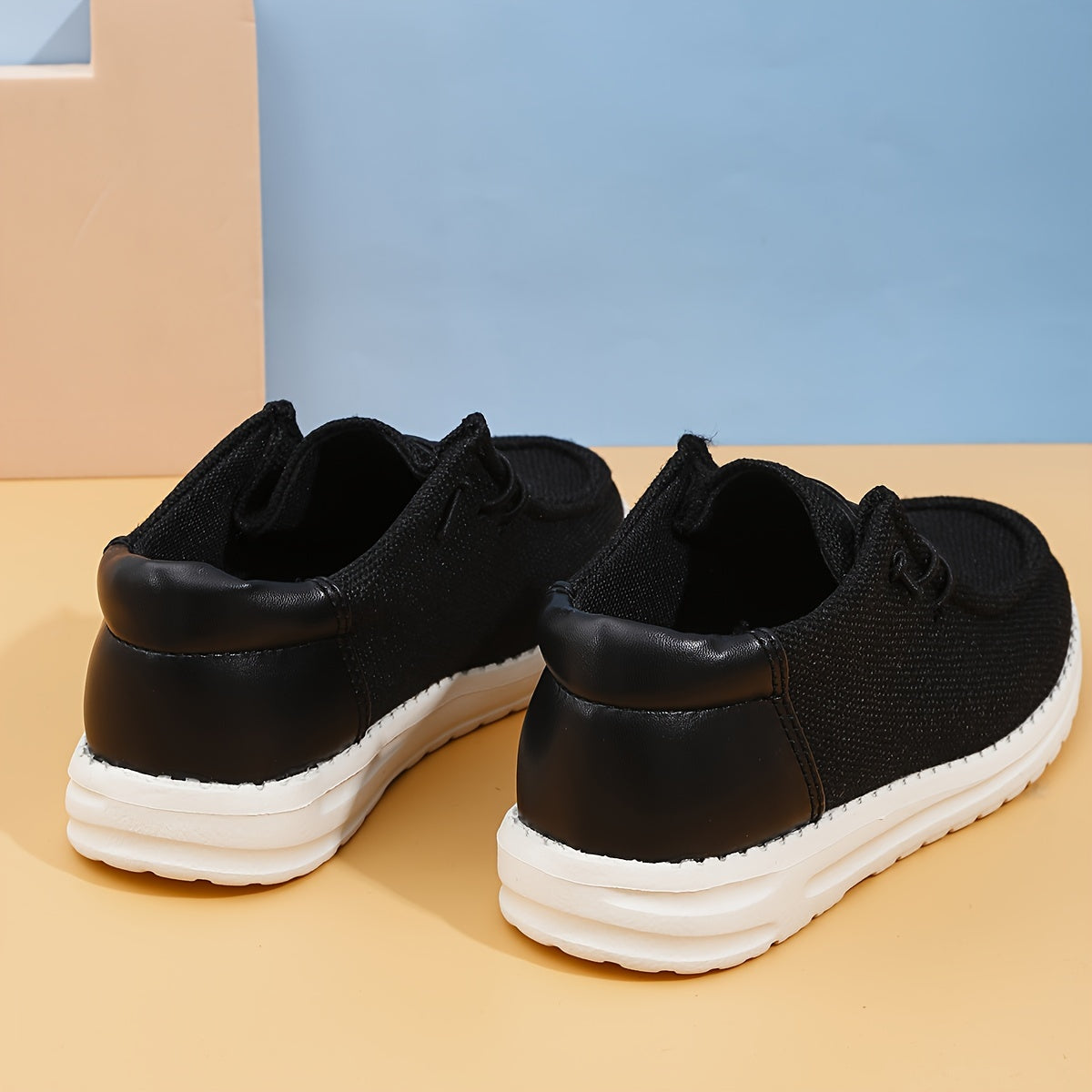 Boys' casual, comfortable canvas shoes in solid colors, ideal for all seasons.