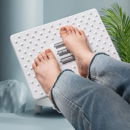 1-piece Ergonomic Anti-Skid Desk Footstool made of plastic with square shape designed for office use. It can be folded and used as a work platform or ottoman with non-electric features. The footstool has durable thick legs and a space-saving design.