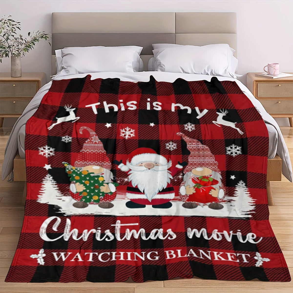 Get cozy this holiday season with our 1-piece Festive Christmas Movie Watching Blanket. This reversible flannel fleece throw features a charming Santa print and a contemporary style. Made with tear-resistant, all-season materials, this multipurpose