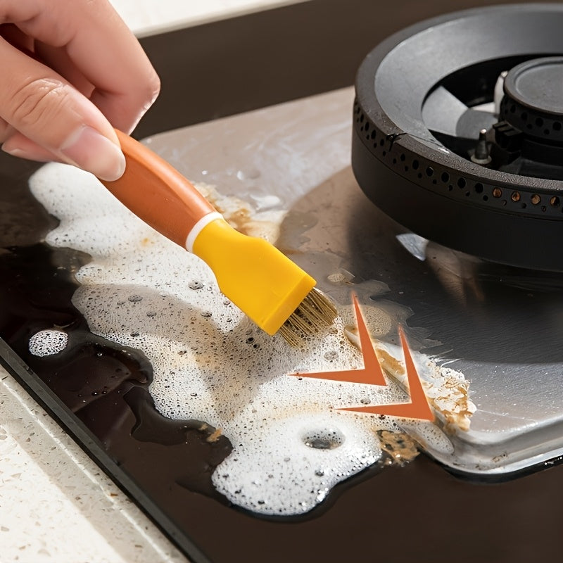 A versatile cleaning tool with dual heads for glass and ceramic surfaces, this multifunctional scraper is perfect for removing stains from kitchen cooktops. It can also be used for crevice cleaning, glue removal, and various other cleaning tasks. Made