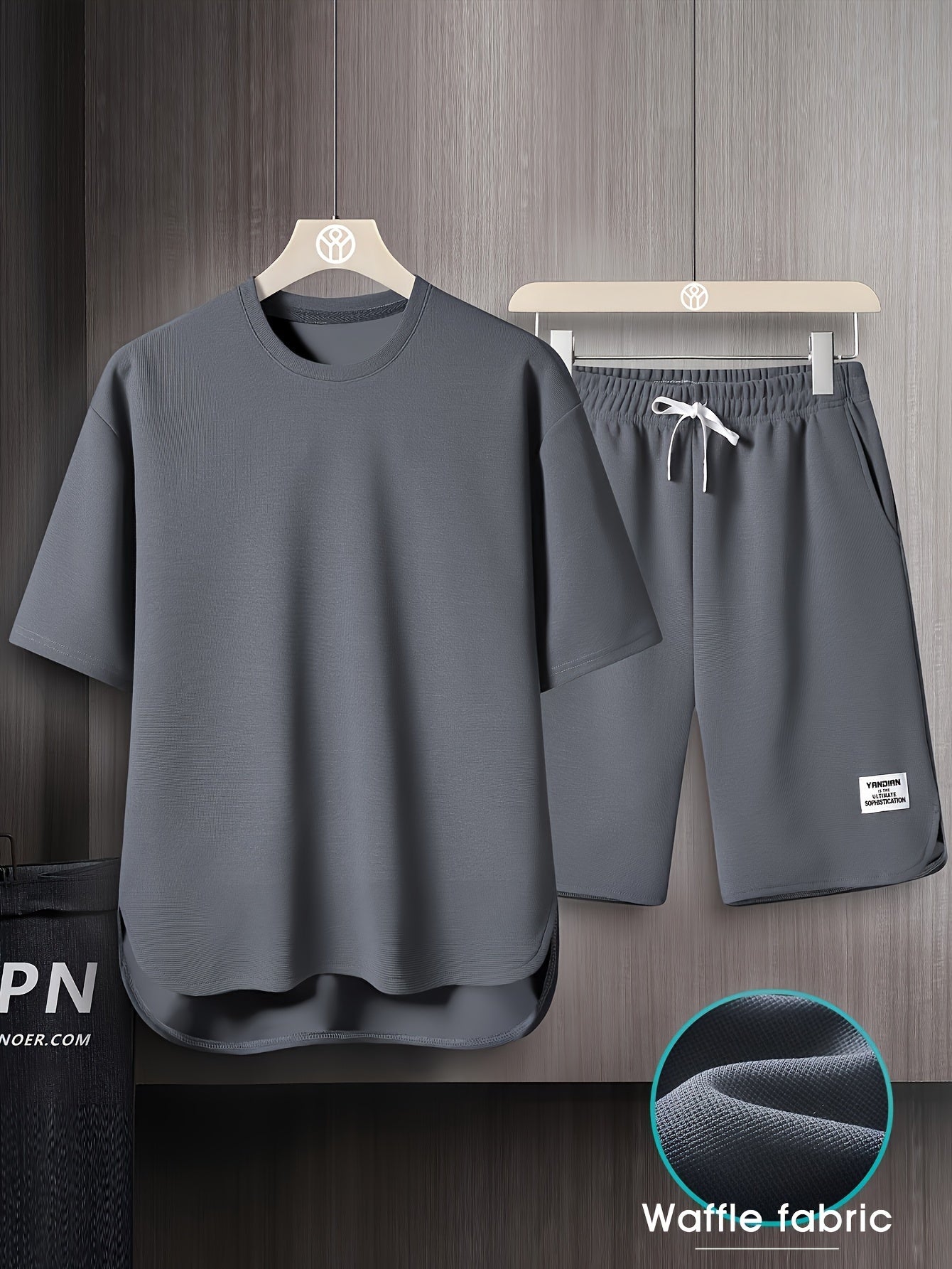 Men's summer short sleeve suit with high-end solid color round neck t-shirt and breathable thin shorts in a two-piece set called AWESOME BIRD.