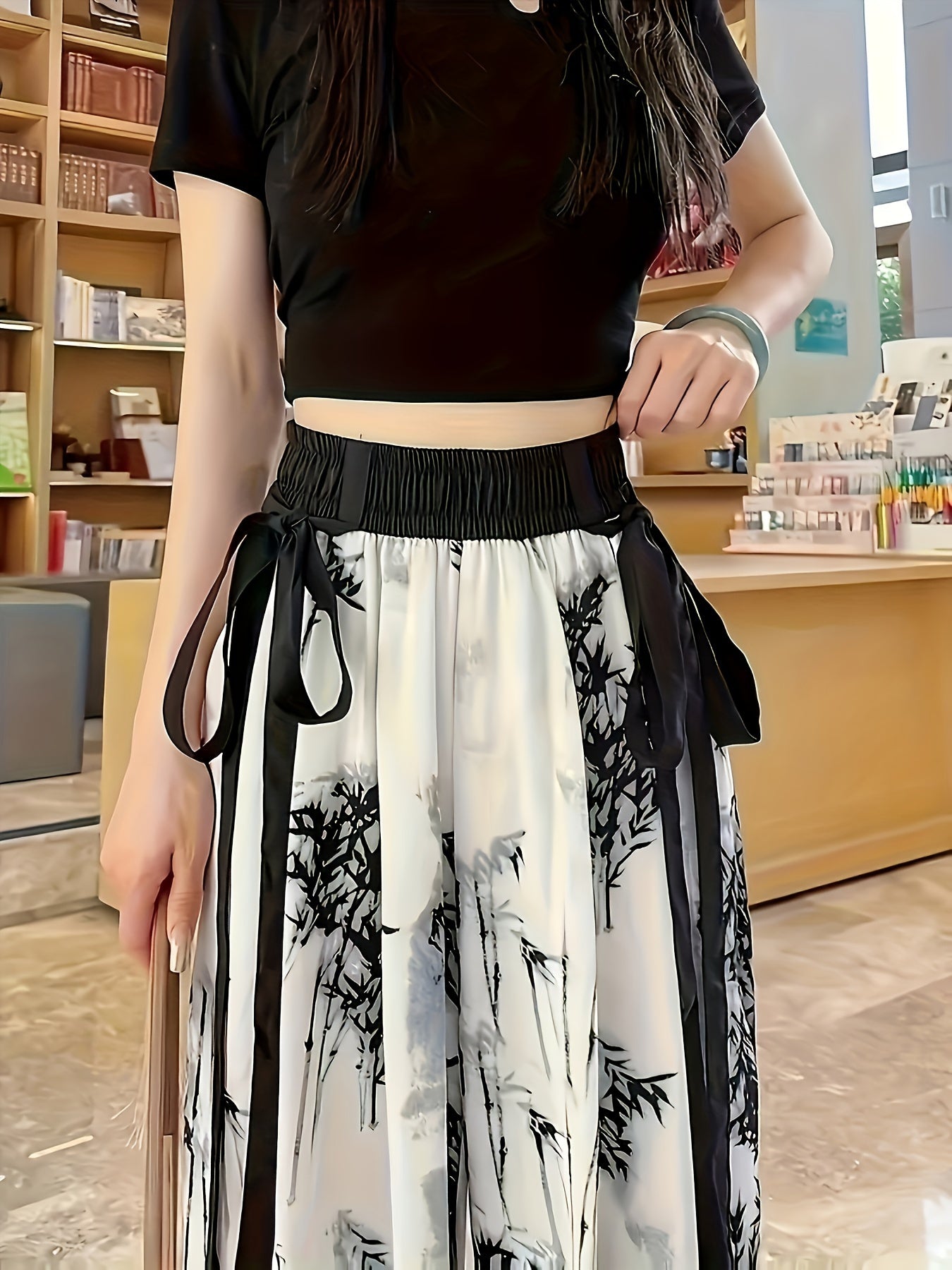 Women's wide-leg pants with plant print and tie-up pockets, made of a polyester blend, in adult size and casual style for spring/summer/autumn.