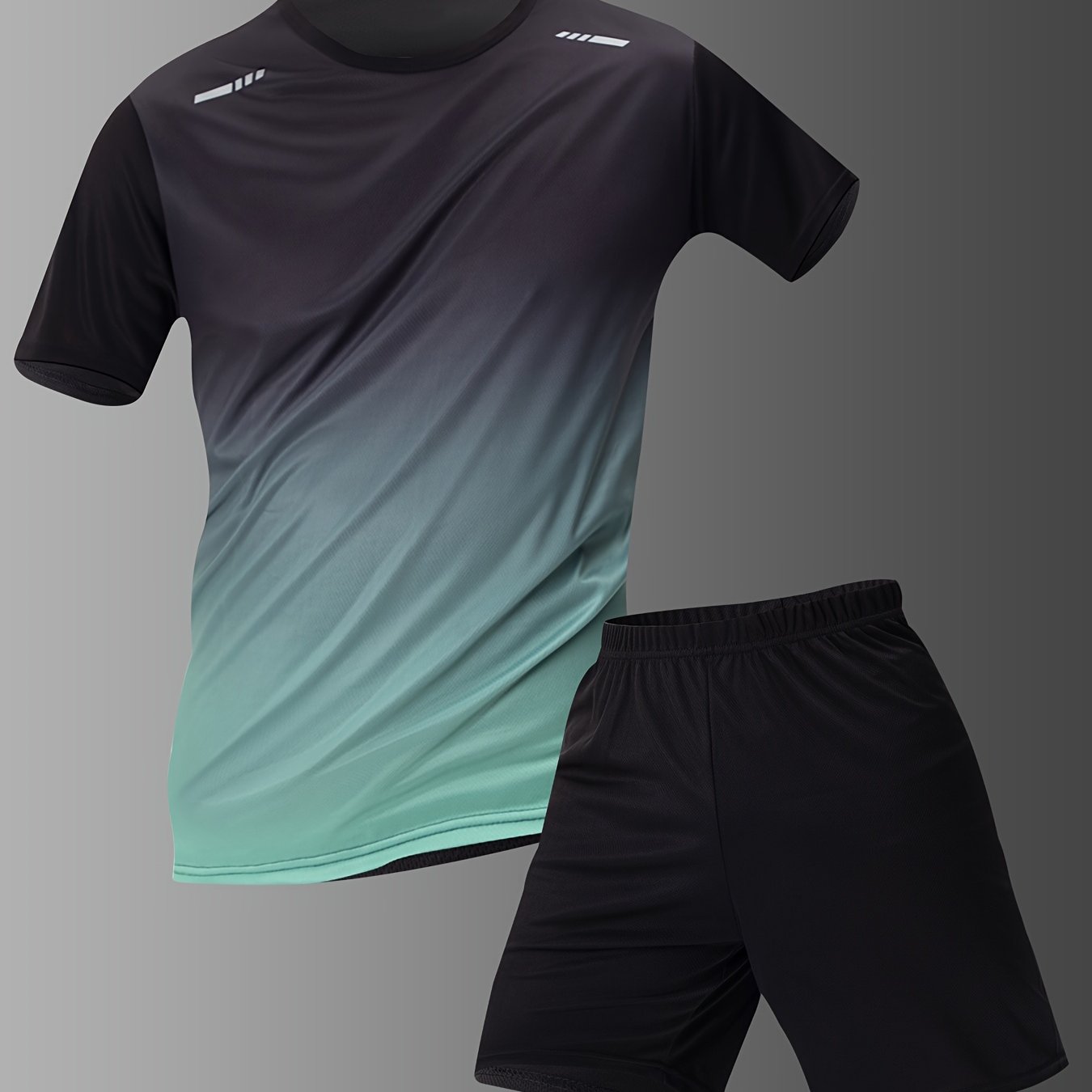 Men's casual sportswear set with gradient short sleeve t-shirt and solid elastic waist shorts for summer sports.