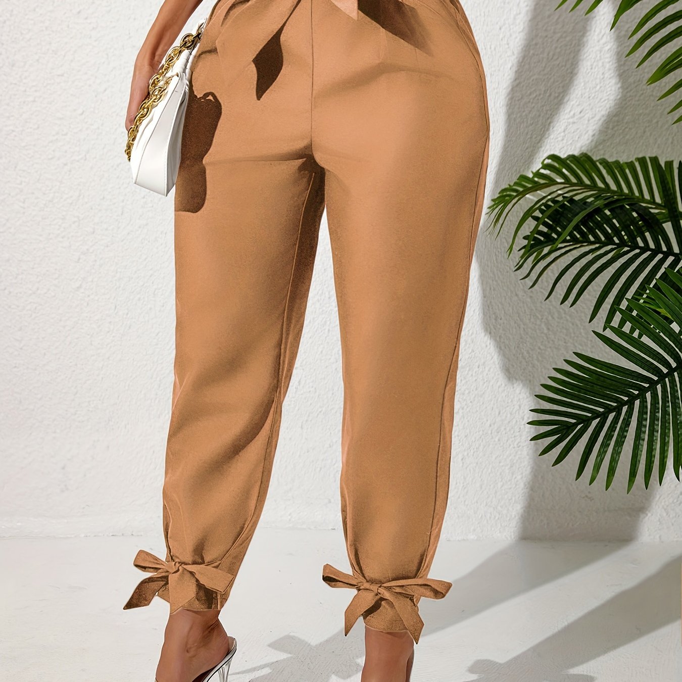 Solid straight leg pants with elastic drawstring waist and elegant bow detail. Perfect for spring and summer in plus size.