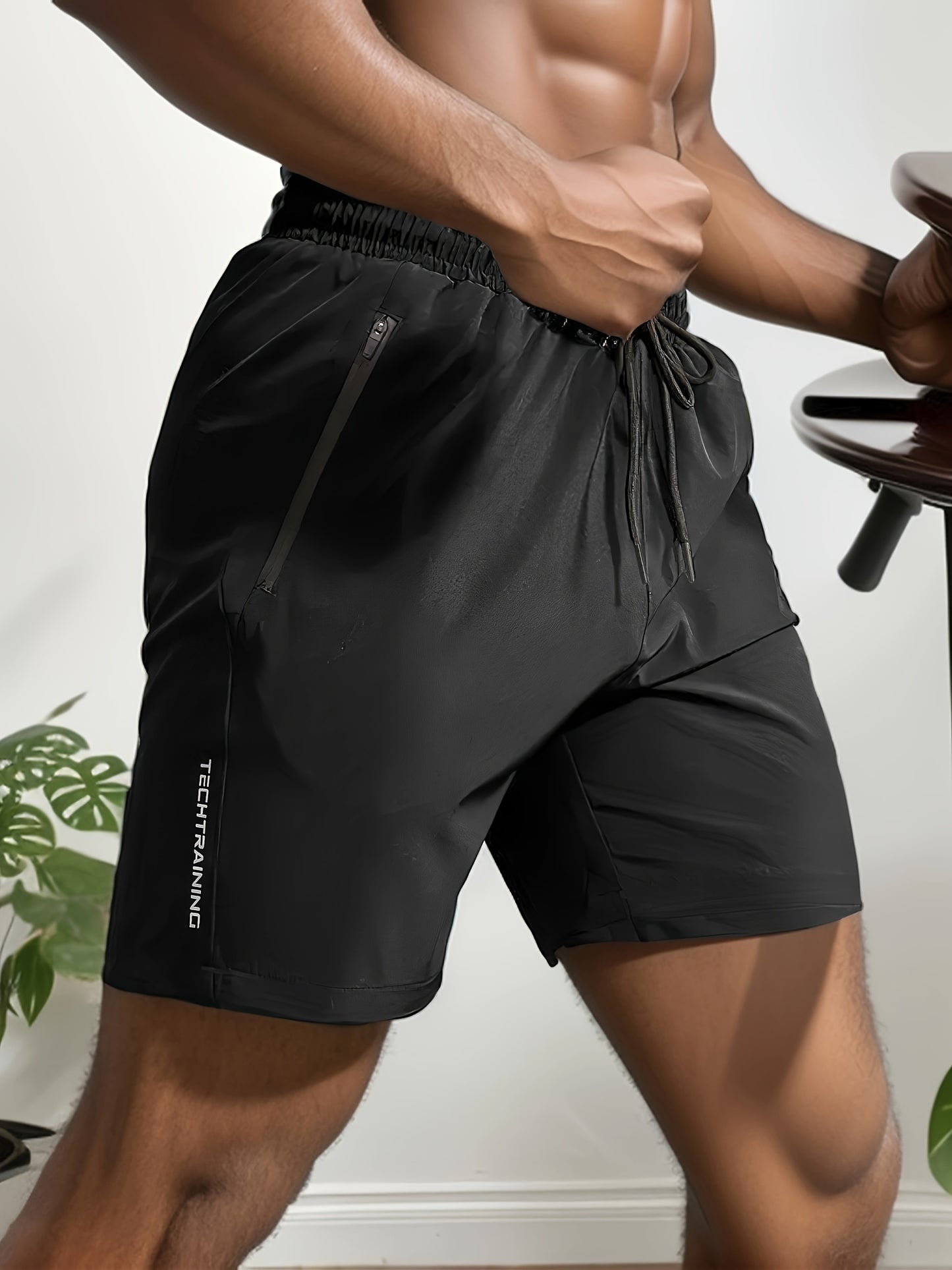 5 men's plus size athletic shorts made of quick-dry, breathable polyester with zipper pockets, ideal for running, training, biking, and hiking.