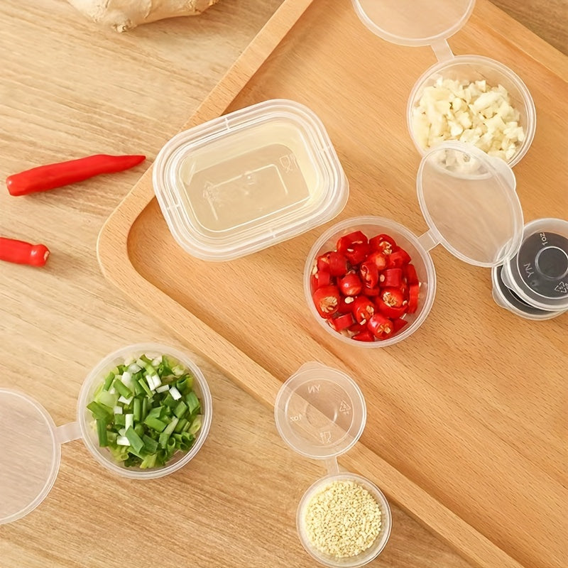 50 transparent disposable sauce boxes for takeout, packaging, and seasoning. These multipurpose food storage boxes come with covers.