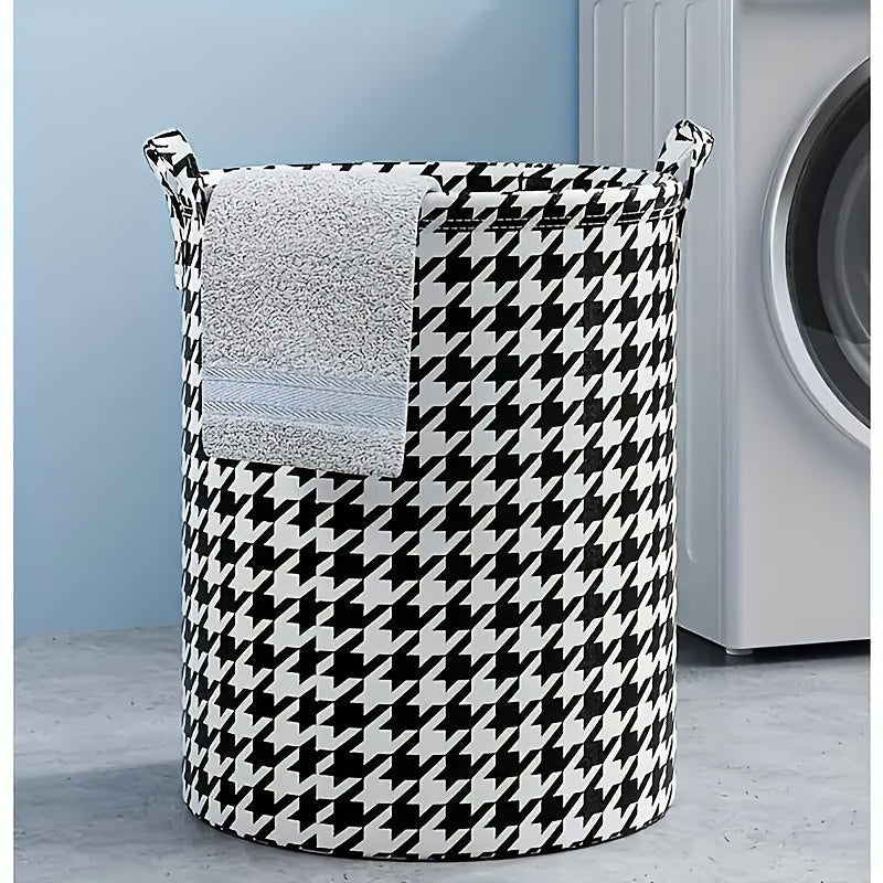 Collapsible laundry hamper with handles and stylish print design made of durable fabric material for bathroom and bedroom use.