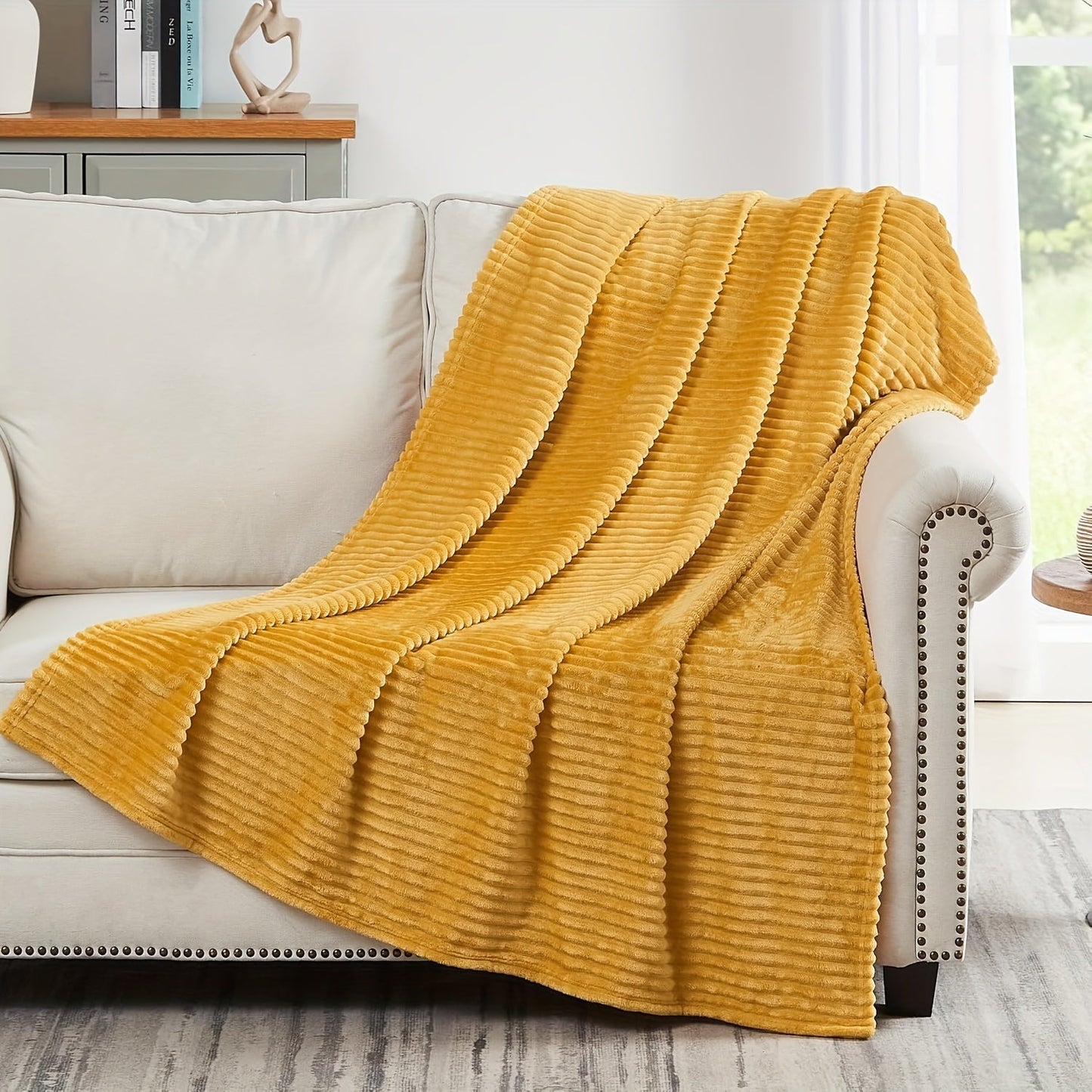 Stay cozy and warm with our Ultra-Soft Oversized Fleece Throw Blanket. Made with lightweight and warm 280GSM microfiber, this blanket features a 3D ribbed Jacquard design for added style. Hypoallergenic and perfect for all seasons, this blanket is a