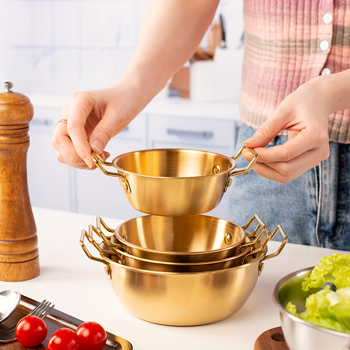 Durable stainless steel bowl with handles for versatile use, ideal for Asian cuisine.