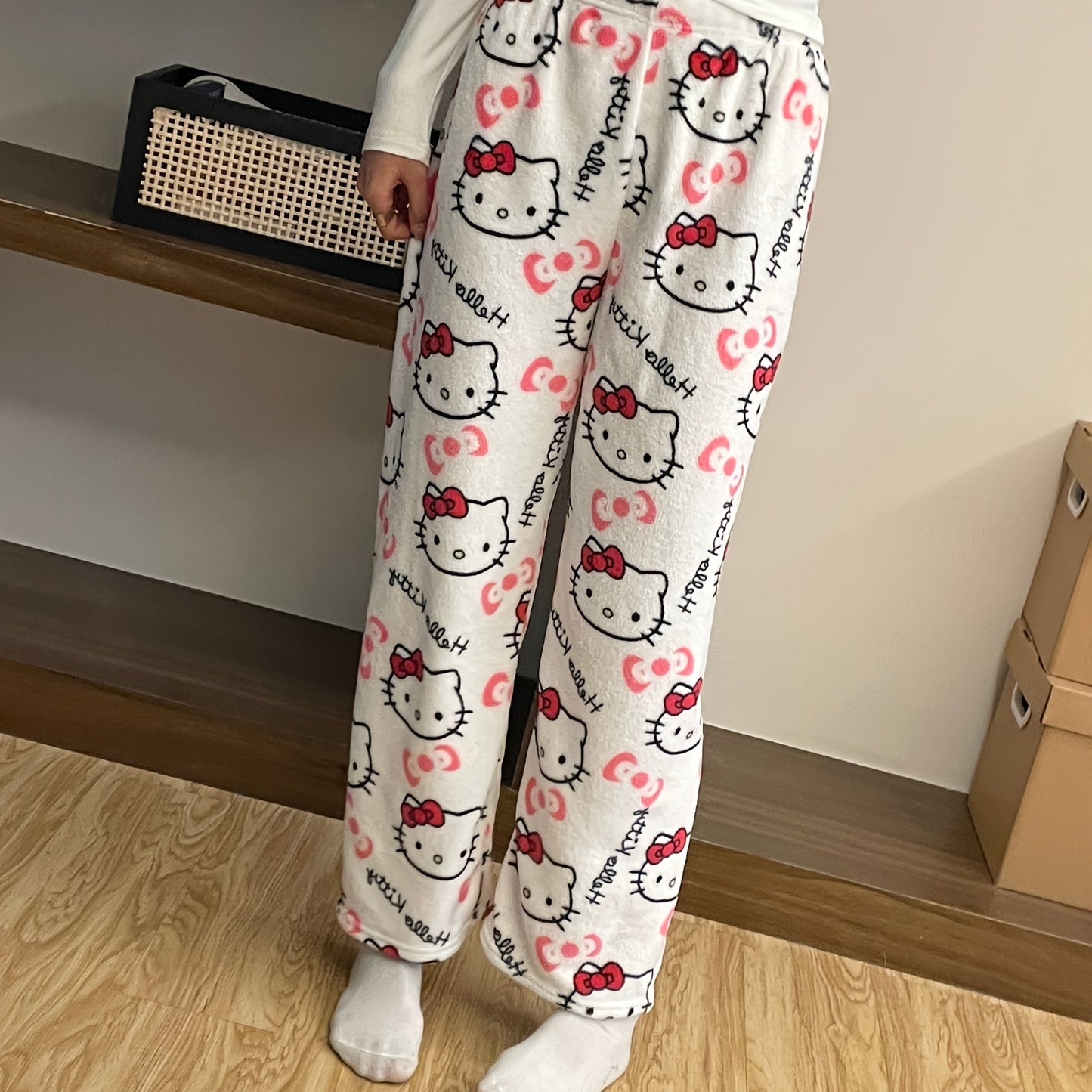 Sanrio Hello Kitty cozy flannel pajamas for women, officially licensed and perfect for relaxing and sleepwear.