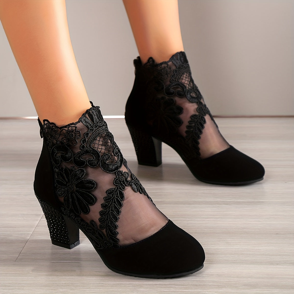 Elegant mesh boots for women with chunky heel and back zipper, round toe for comfort and breathability.