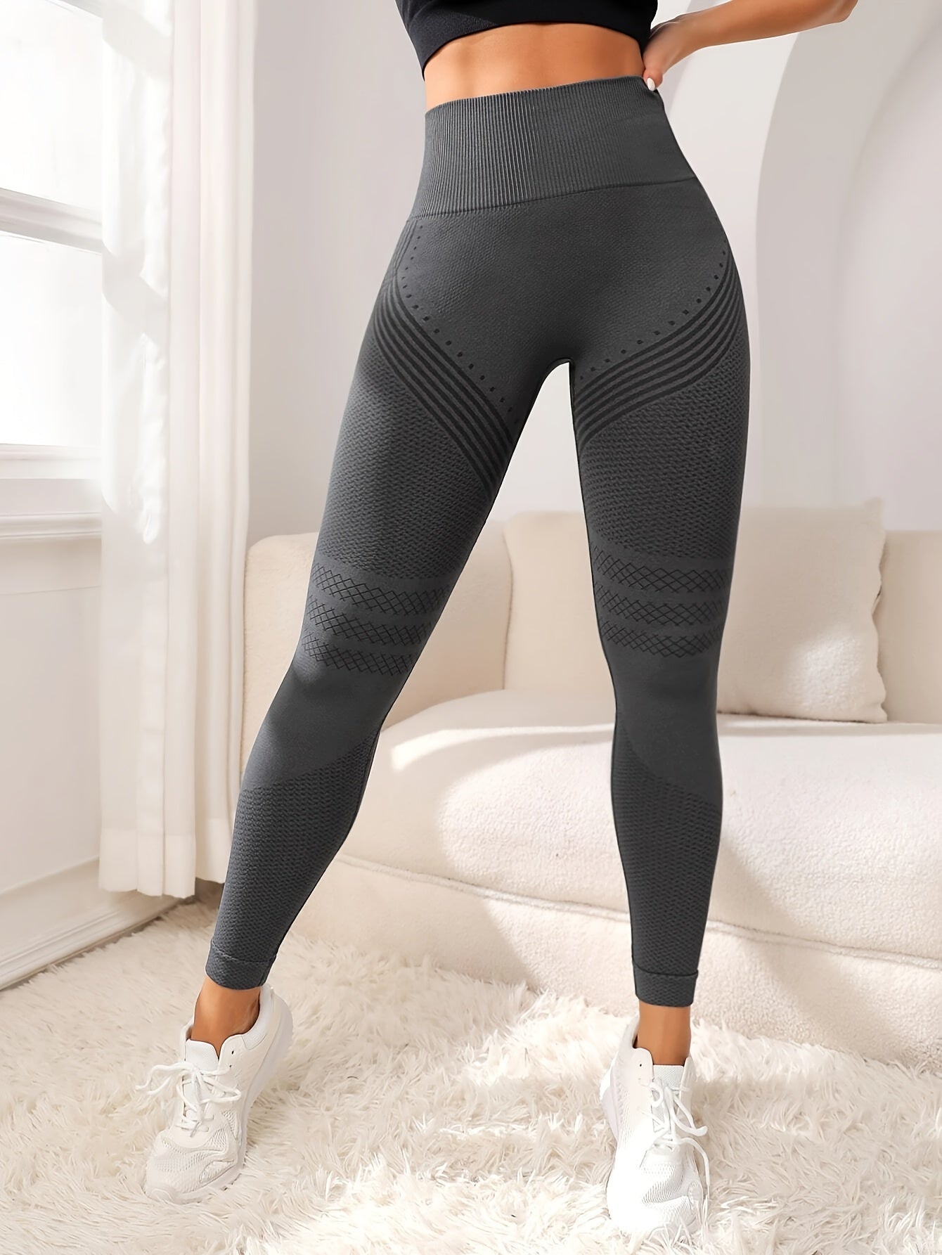 High waist seamless yoga pants with thigh-lifting feature, quick-dry and high elasticity. Made of 90% Polyamide and 10% Elastane blend. Solid color with side stripe detail, long length and