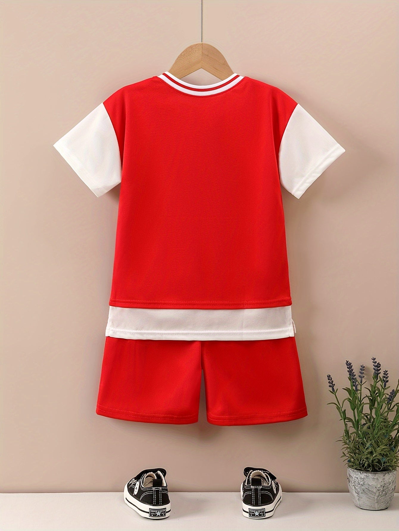 Boy's "Young Winning" casual outfit set includes a round neck t-shirt and shorts, perfect for daily and outdoor wear.