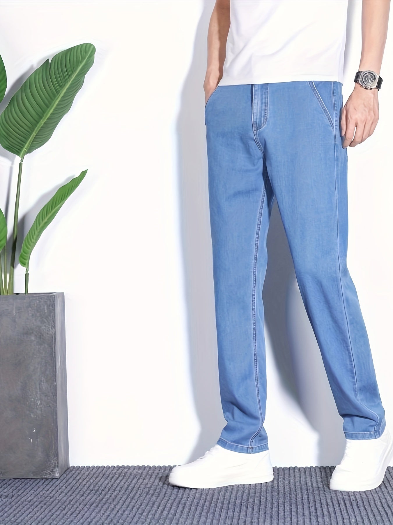 Summer jeans for men, regular fit with breathable lightweight denim and pockets.