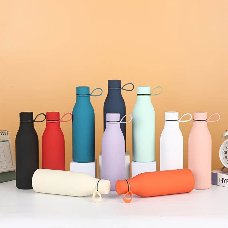 Stainless steel vacuum insulated water bottle with carrying handle, leak-proof design, and 500ml capacity, perfect for outdoor activities and gifts.