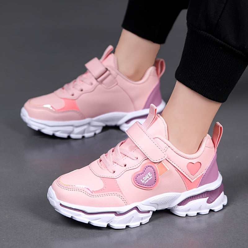 Stylish black and pink sneakers with glow-in-the-dark and shock-absorbing features, ideal for outdoor and casual activities.