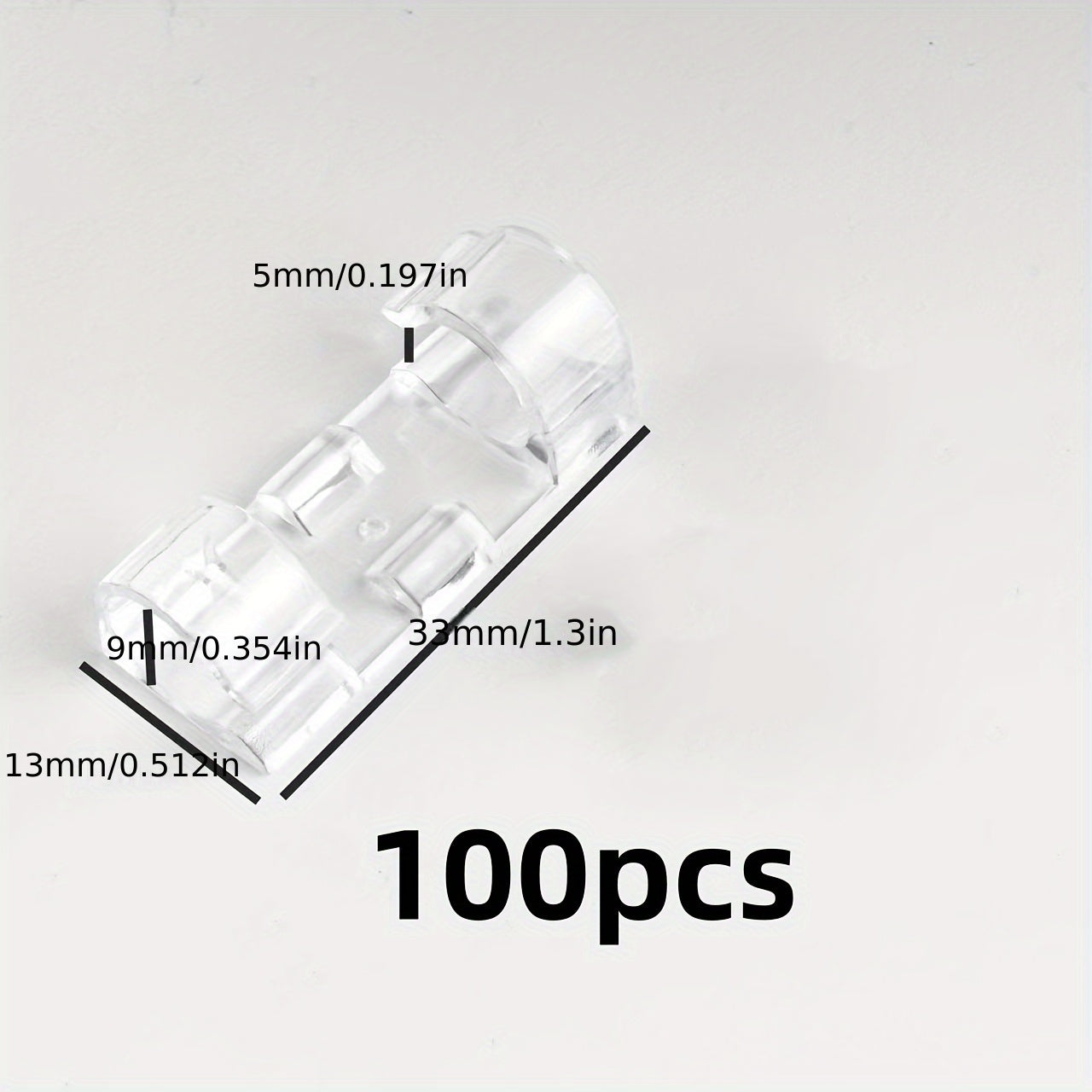 100 transparent adhesive cable clamps for managing power lines, suitable for walls and under tables.