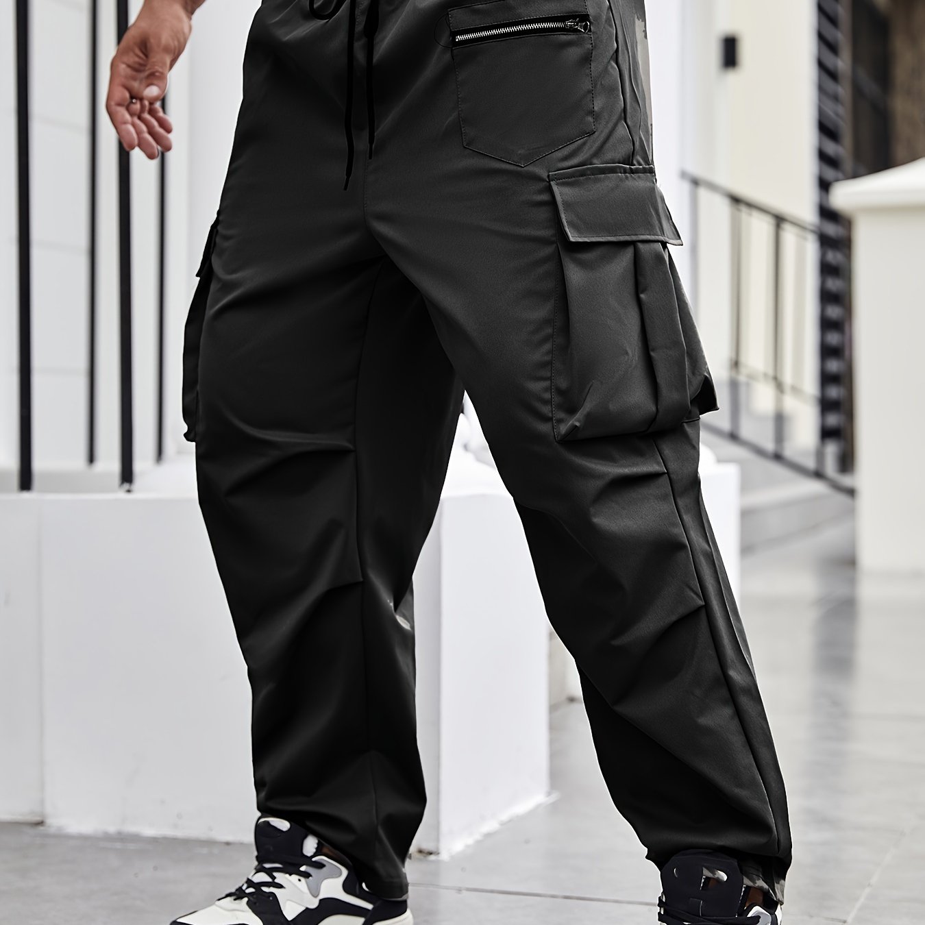 Durable polyester cargo pants for men in plus sizes, suitable for all seasons.