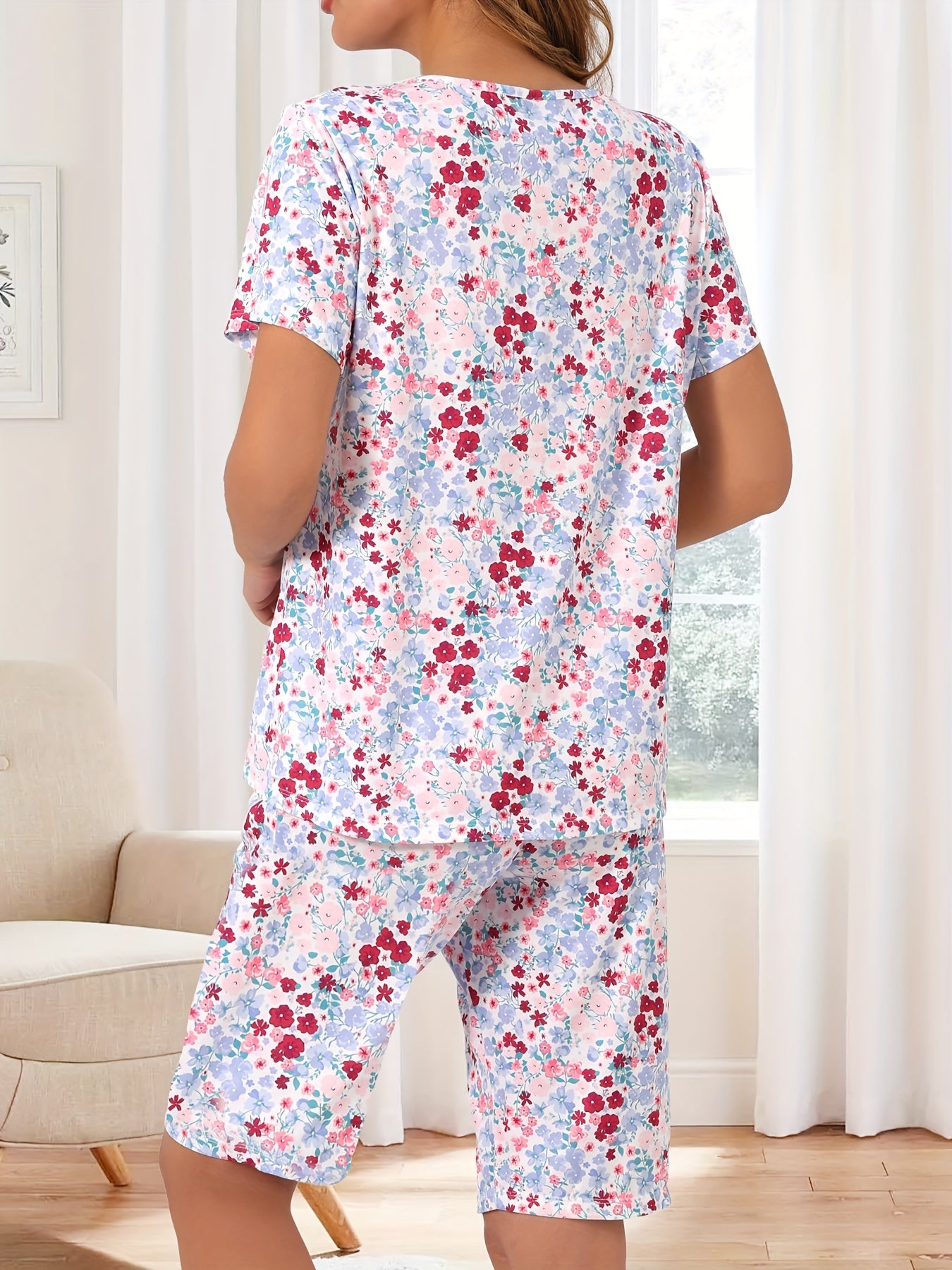 Floral print 2-piece pajama set for women with round neck top and shorts, perfect for summer sleepwear.