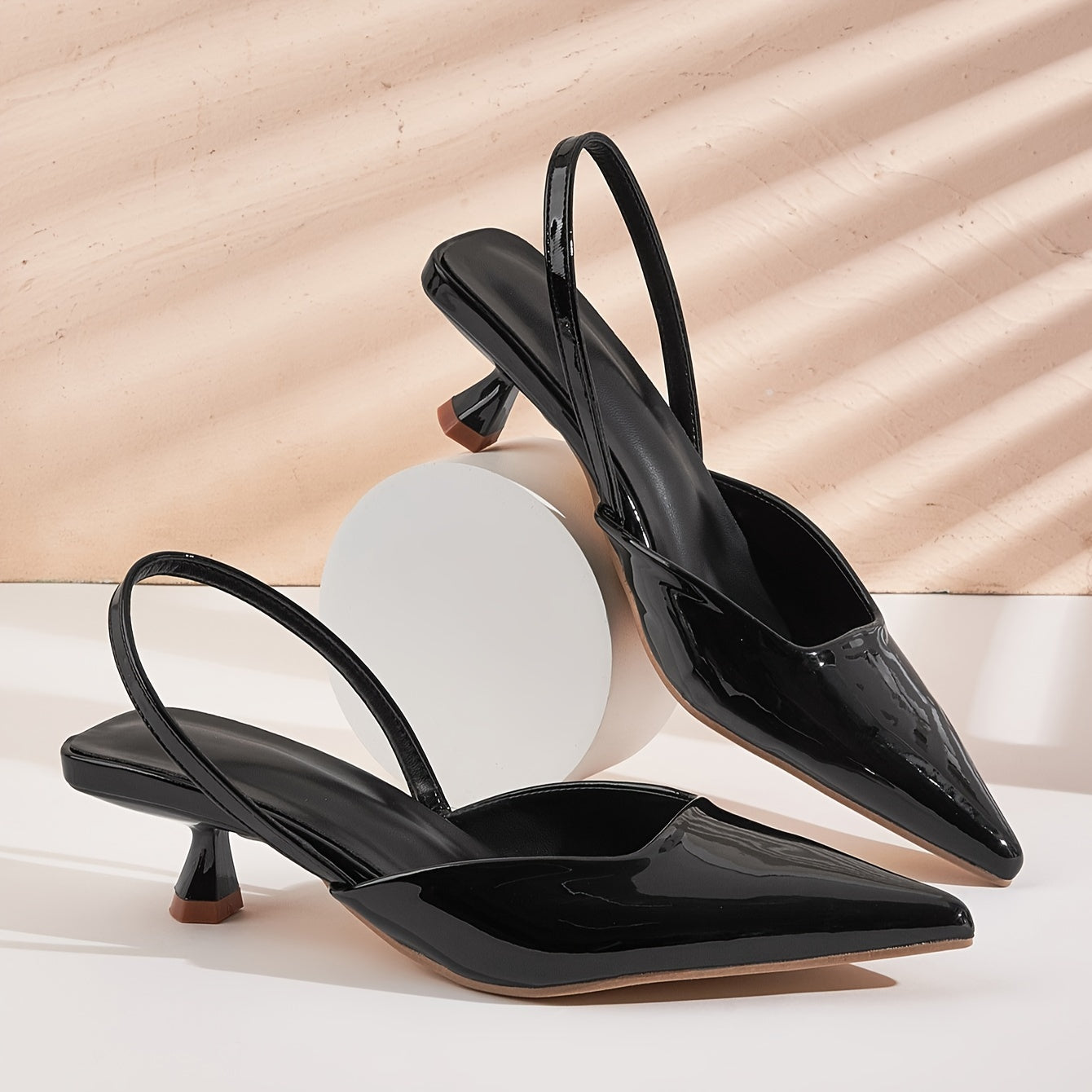 Lightweight women's kitten heel pumps with elegant design, pointed toe, ankle strap, and faux cover in various colors. Versatile for all seasons.