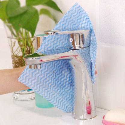 1 roll containing 50pcs of oil-free washable non-woven cloth, disposable dish towels. These versatile towels are perfect for use in the kitchen, living room, bathroom, toilet, and more. Perfect for those looking for a convenient cleaning solution.