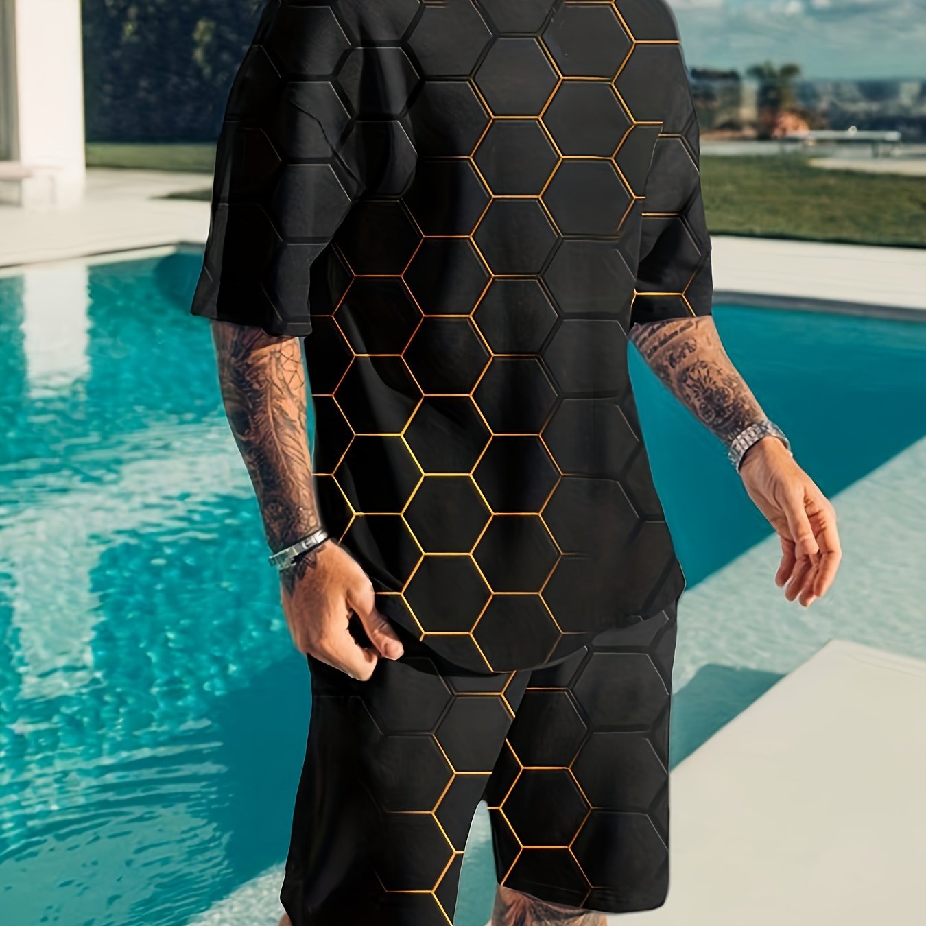 Men's plus size t-shirt and shorts set with honeycomb texture and letter print, ideal for casual sportswear.