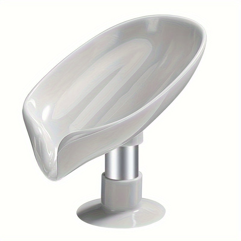 Leaf-shaped soap holder with drain, strong suction, easy installation, enhances decor, keeps soap dry.