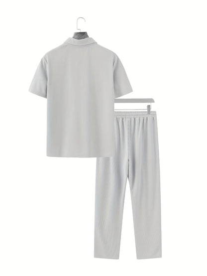 Men's casual outfit: half-zip short sleeve shirt and drawstring pants for outdoor activities.