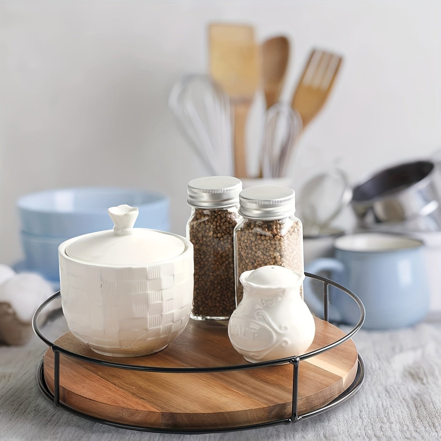 One or two piece rotating spice rack organizer made of Acacia Wood and Metal. This hardwood Susan storage shelf is perfect for holding spices and cosmetics in the kitchen or dorm room. Save space with this open-storage holder designed for easy access.