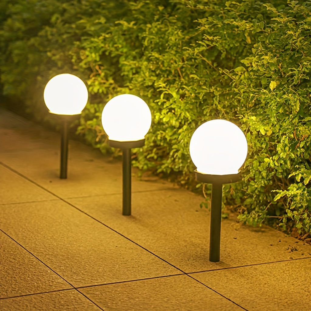 Solar-powered LED garden lights for outdoor landscapes - Durable plastic, automatic on/off, modern design for pathways, yards, decks, lawns, and patios.