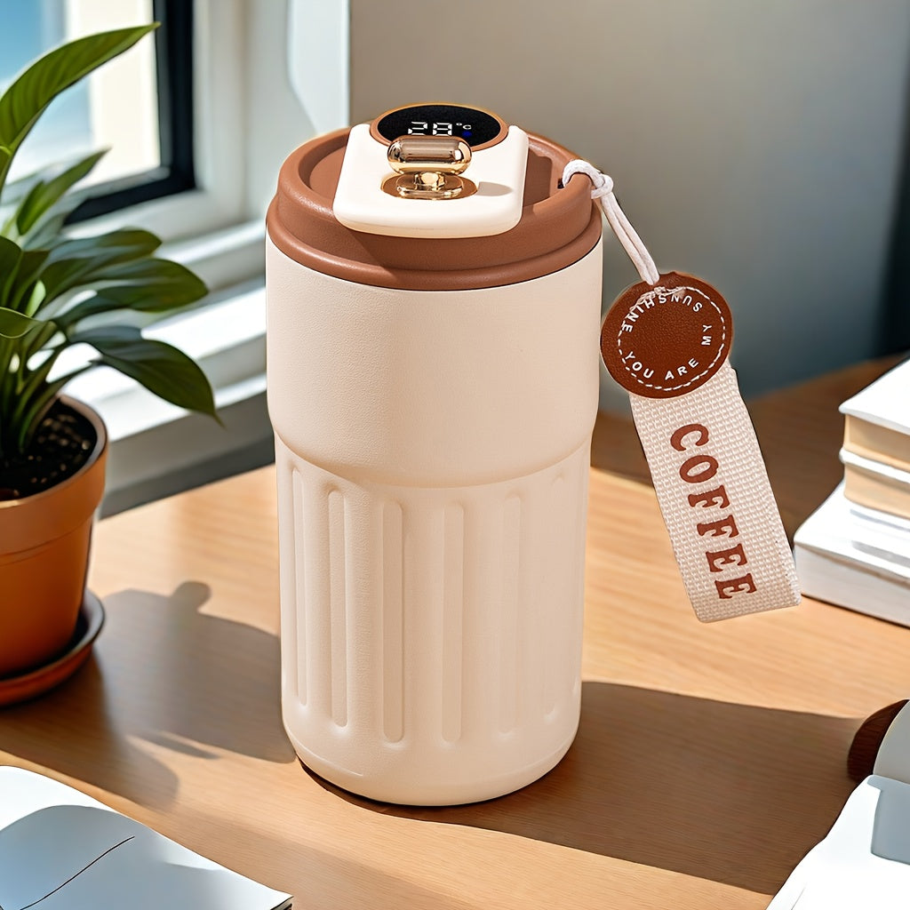 A 410ml stainless steel travel mug with temperature display, keeps beverages hot or cold, perfect for any occasion.