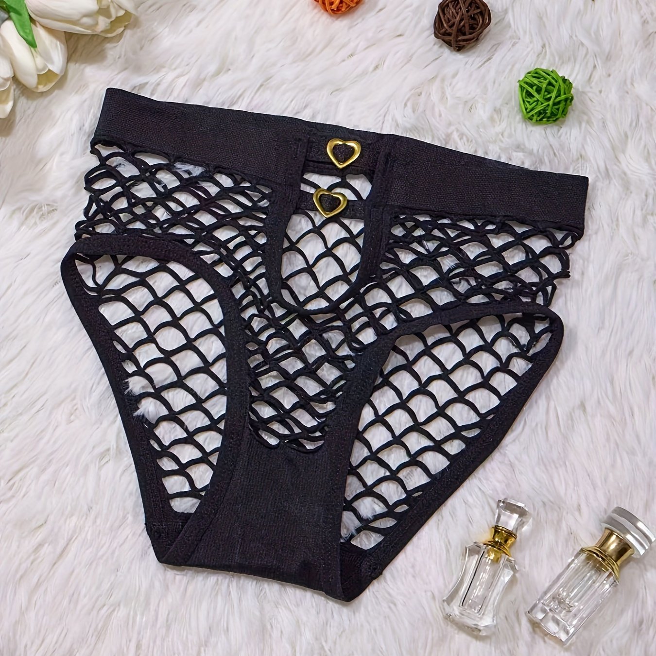 Heart-shaped mesh brief with hollow-out design, low waist panties for women's lingerie.