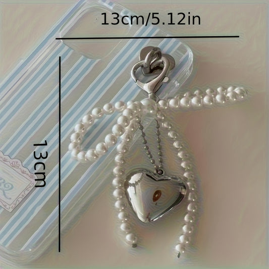 Large heart-shaped metal pendant with pearl bow - ideal for Valentine's Day. Versatile accessory for mobile phone cases, cameras, bags, and keychains. Perfect gift for women and girls.