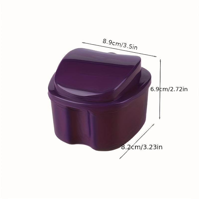 Durable plastic case with built-in brush and filter for complete denture care.