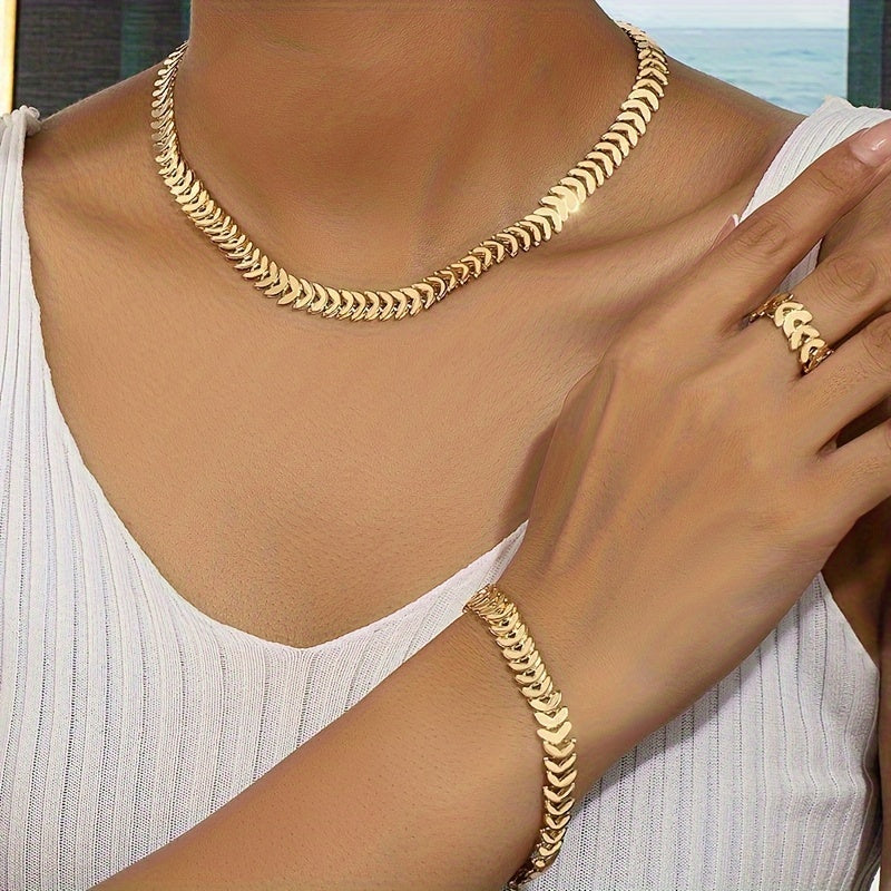 Hip-Hop-inspired jewelry set for women includes a necklace, bracelet, and ring. Perfect for casual attire or gifting in the spring and summer. 3 pieces in total.