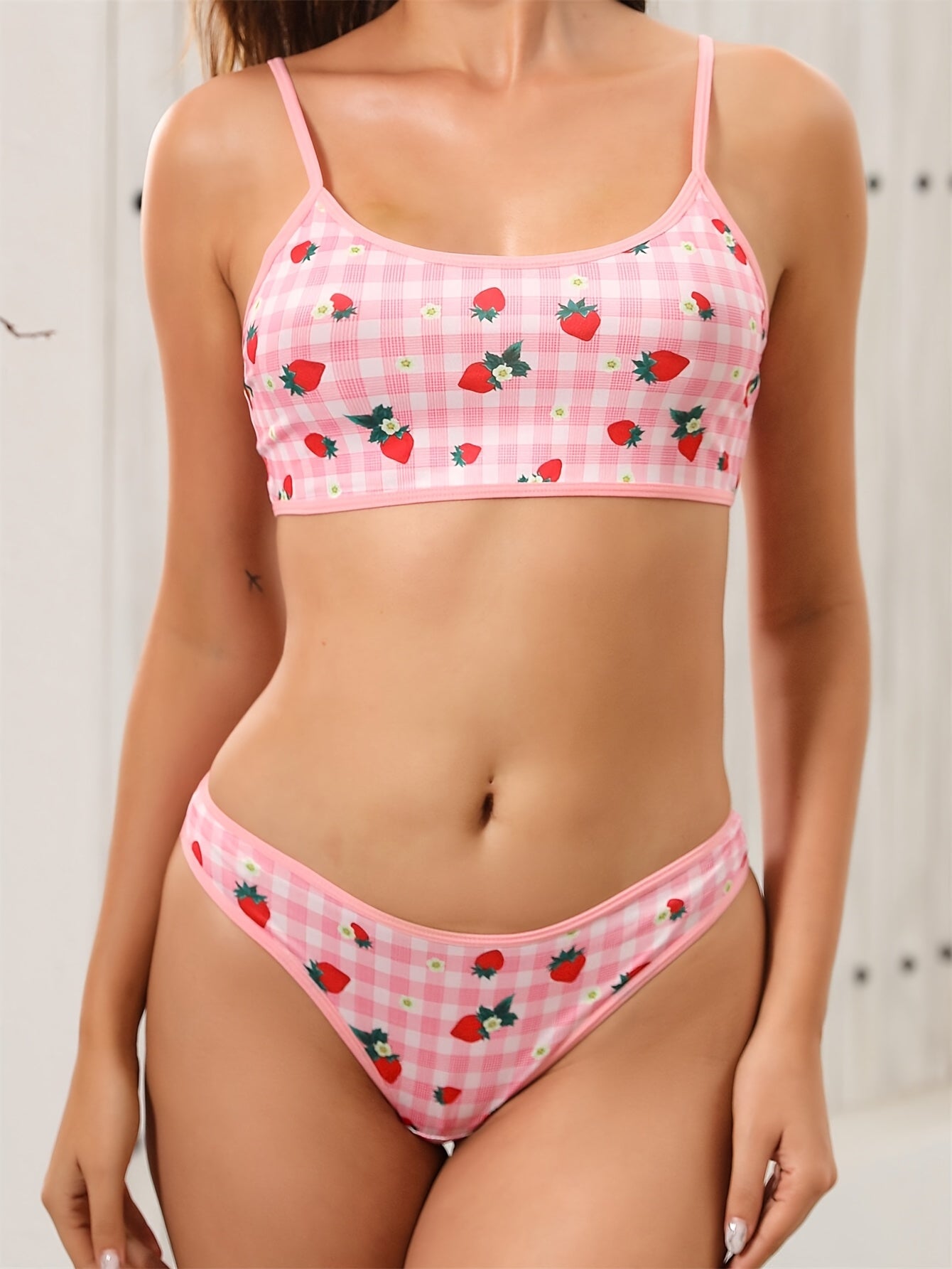 Dircho Women's lingerie set includes 2 pieces made of polyester and elastane knit fabric. It features a casual all-over print design with medium support, non-padded bra, and contrast