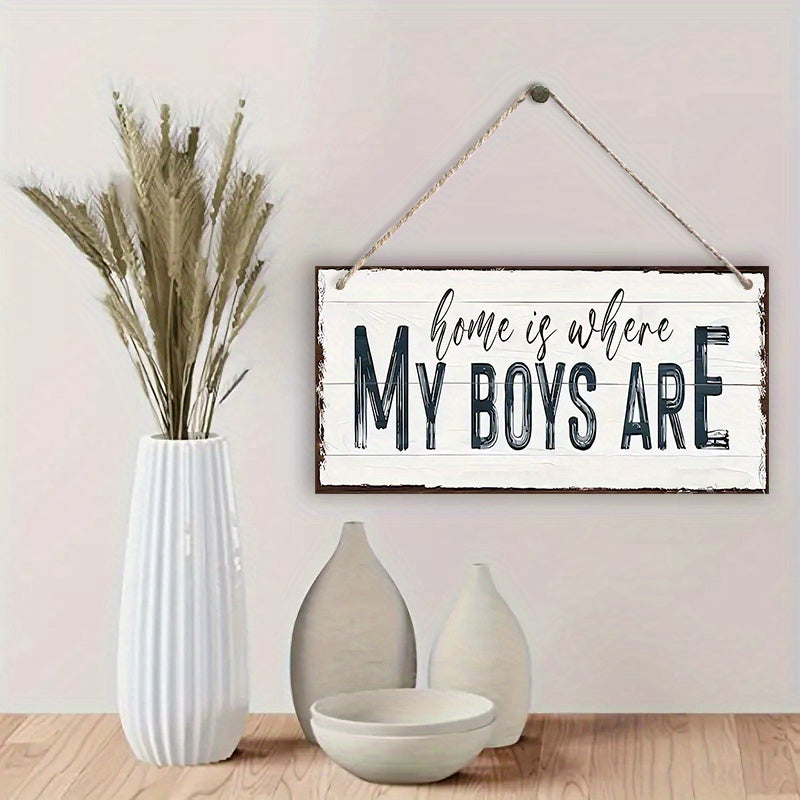 Wooden sign with the words "Home Is Where My Boys Are," a delightful gift idea for a new mom or Mother's Day. This farmhouse-style wall decor is perfect for the bedroom and adds a touch of shabby chic charm. It's a wonderful keepsake and a lovely