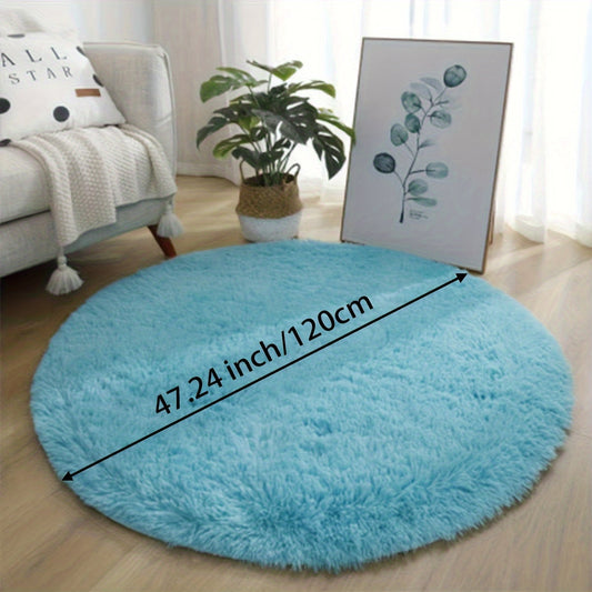 Large round area rug made of soft plush shaggy material, featuring a non-slip and waterproof design. This polyester fiber rug can be hand washed and is perfect for adding a cozy touch to your living room, bedroom, nursery, game room, dorm, or teen room