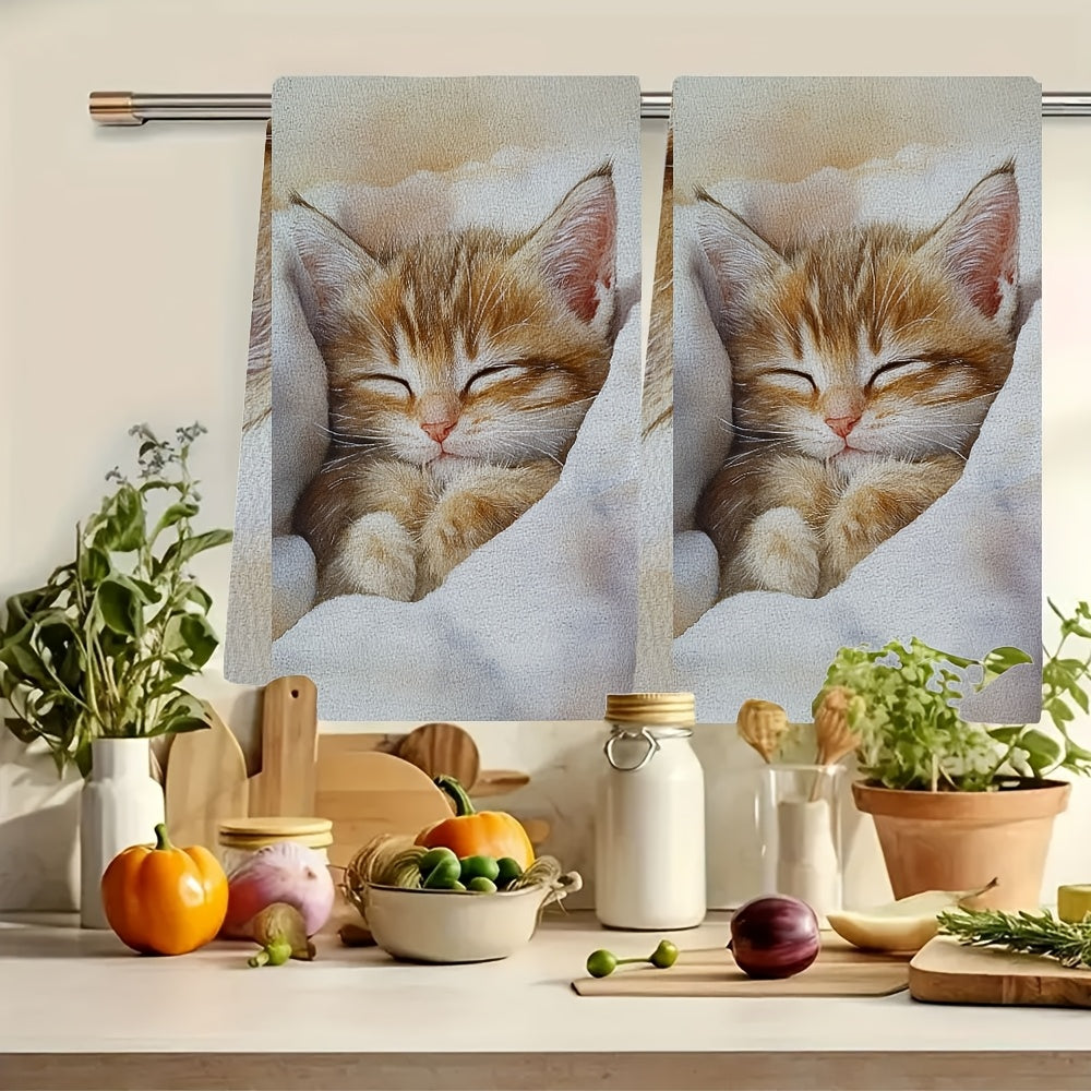 This collection includes 2 ultra-soft kitchen towels with a delightful design of a waking kitten, known for its gentle purring. These towels are highly absorbent, perfect for drying dishes, and can also be used as holiday decorations. They are machine