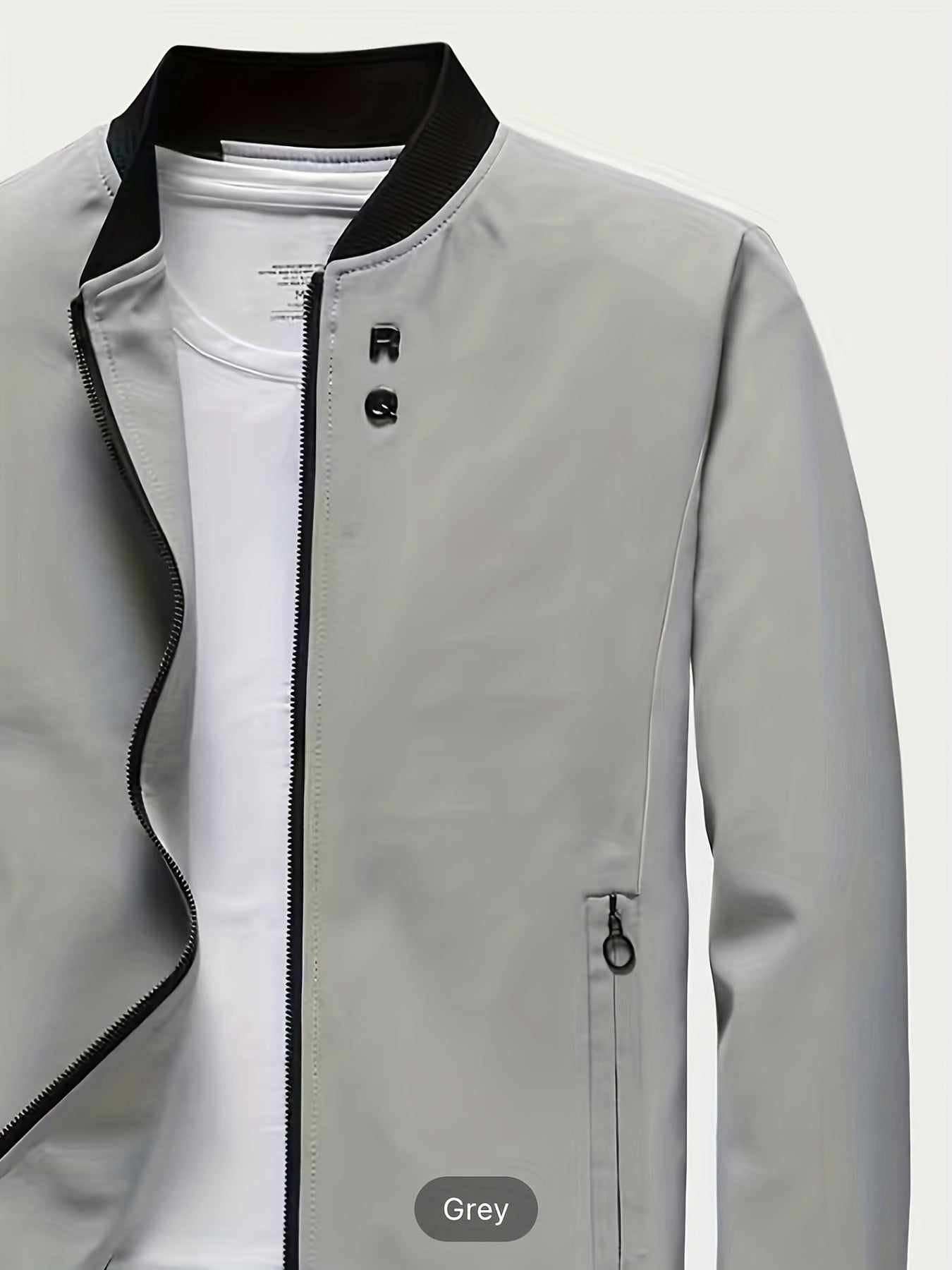 Casual long-sleeved jacket with zip, stand collar, pockets, and slim fit; ideal for spring and autumn.