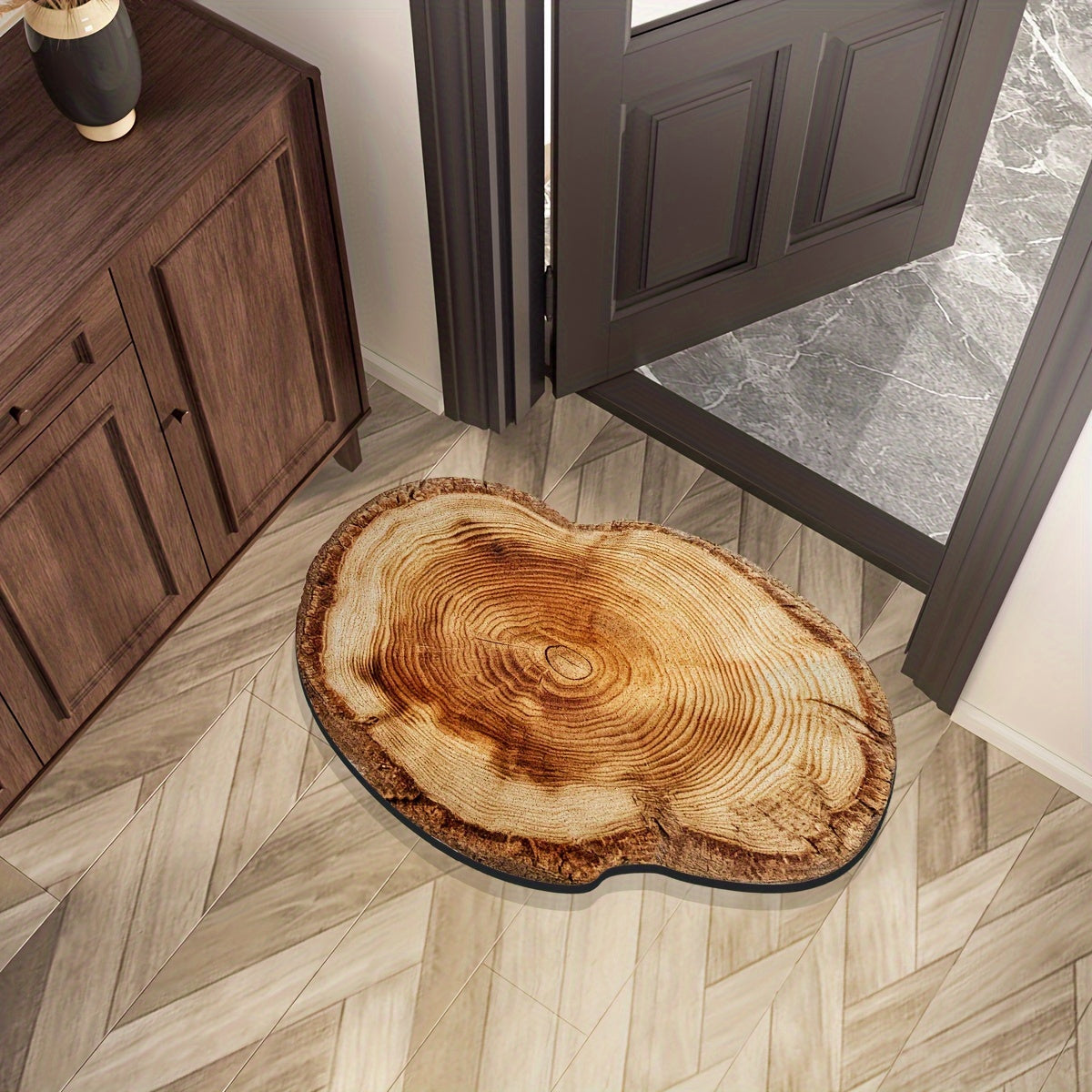 Wood Grain Tree Ring Design Indoor Doormat featuring a non-slip rubber backing for added safety. This decorative floor mat is made from machine-made polyester and is hand-washable. The low pile entry rug is flame resistant, making it perfect for use in