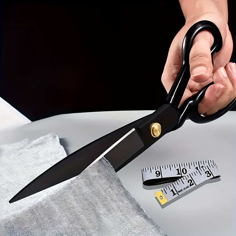 Tailor's Scissors made of high carbon steel with razor blade for fabric cutting. Features right-handed design with ergonomic black handles, ideal for precision cutting in crafting, sewing