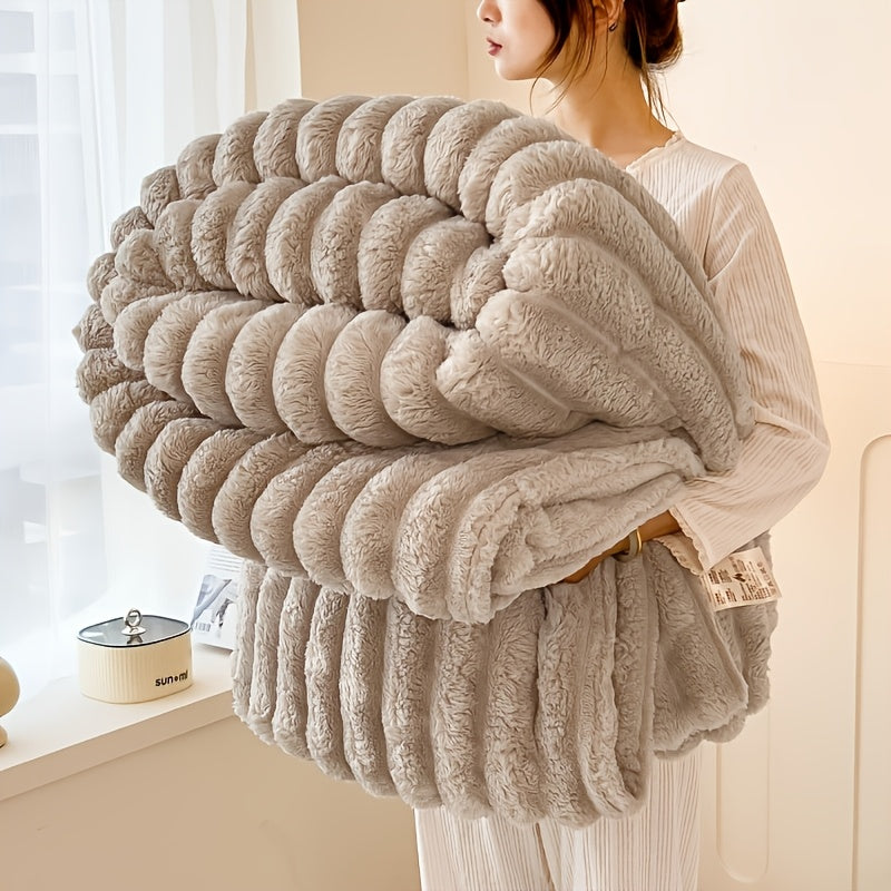 Get cozy with this multifunctional blanket made of ultra-soft milk fleece. Featuring a modern striped texture, this blanket is perfect for all-season comfort on your bed, sofa, or even while camping. Machine washable for easy care, this blanket is an