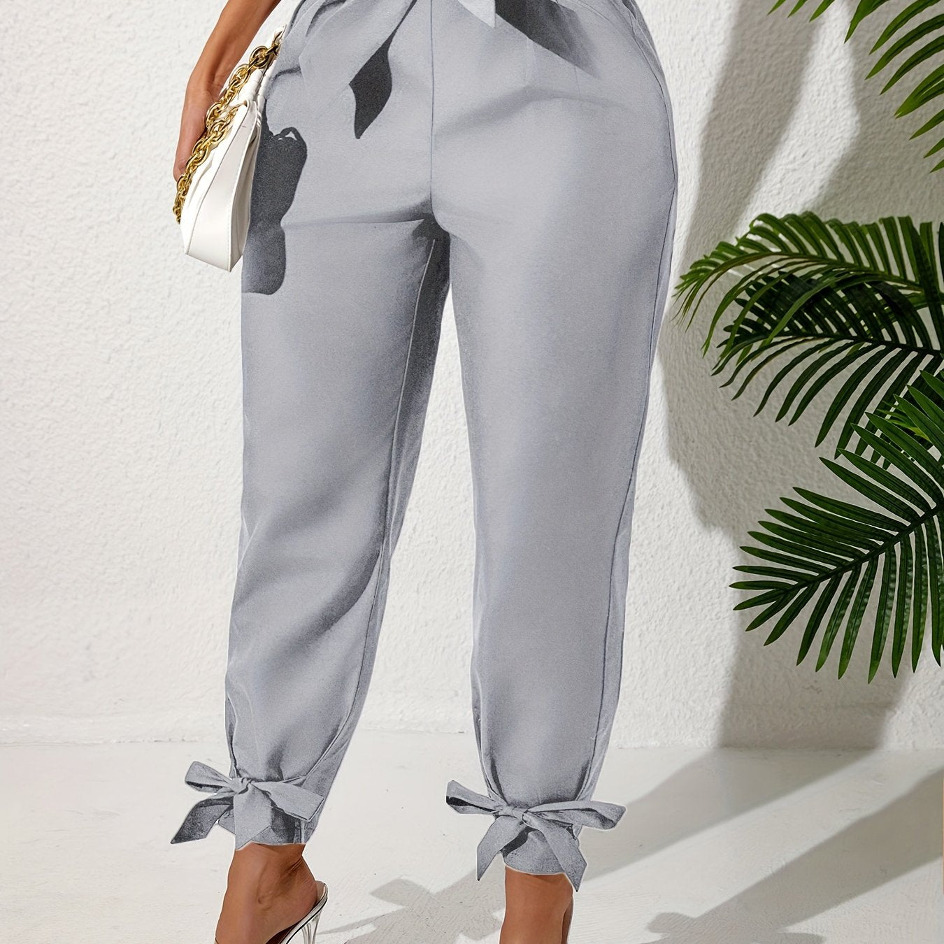 Solid straight leg pants with elastic drawstring waist and elegant bow detail. Perfect for spring and summer in plus size.