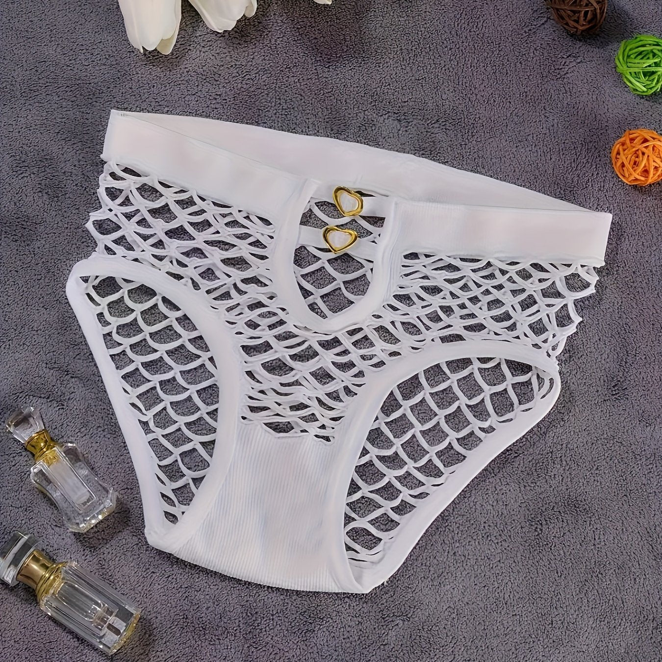 Heart-shaped mesh brief with hollow-out design, low waist panties for women's lingerie.