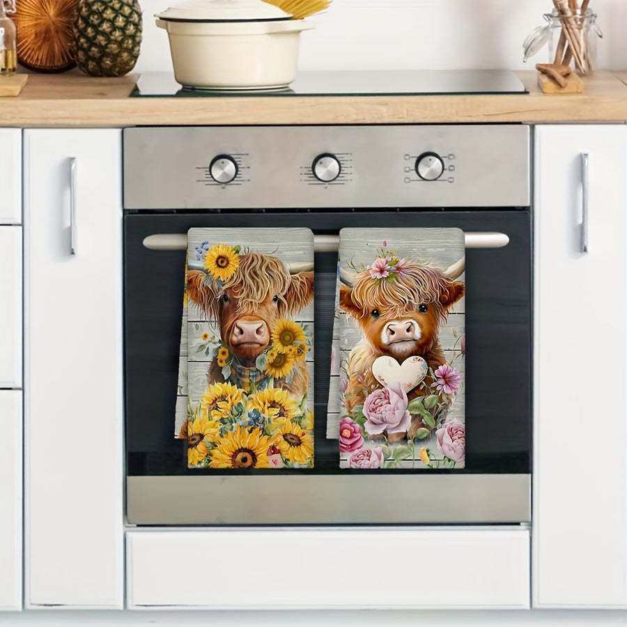 Set of two colorful hand towels with sunflower cow pattern, farmhouse style. Perfect for kitchen or bathroom use.