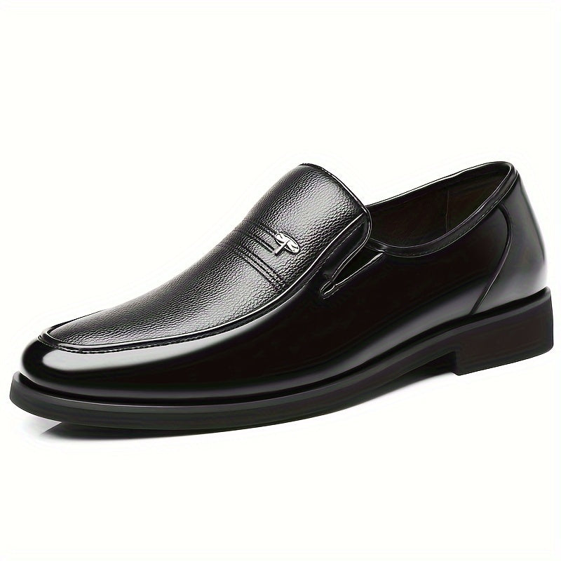 Men's Genuine Leather Loafers in sleek black for business or casual wear. Round toe, rubber sole, smooth leather upper. Perfect for office or outdoor events. Stylish slip-on with durable