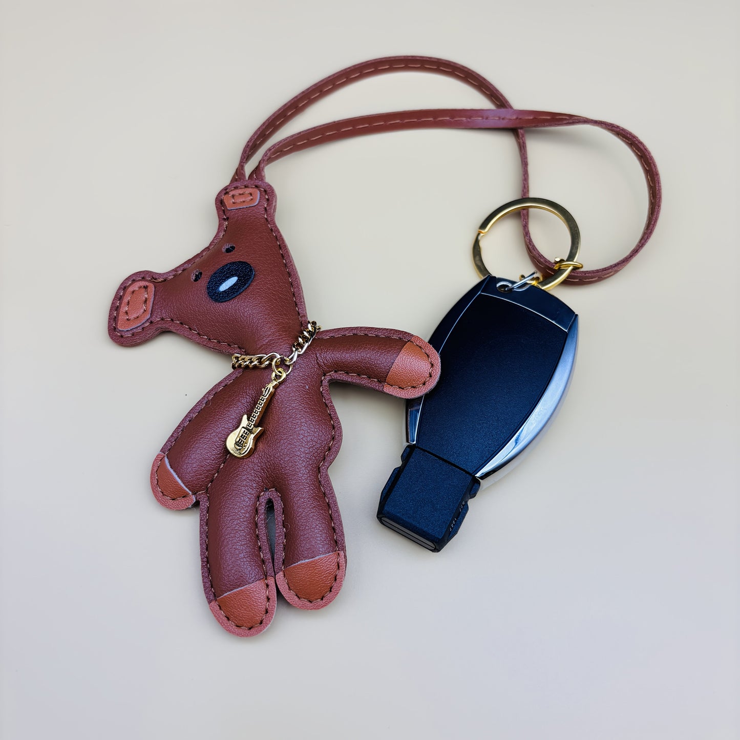 Fashdiy's exclusive high-quality custom faux leather tilted head music bear keychain is a versatile accessory, perfect for attaching to bags, phones, or cars. This unique accessory makes for an ideal gift for Christmas, Valentine's Day, or any party